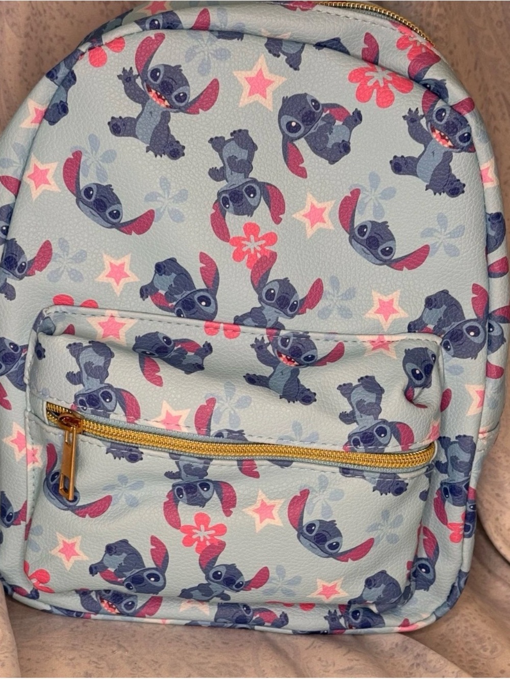 Disney Stitch Light Blue Mini Backpack with Pink Flower & Star Accents